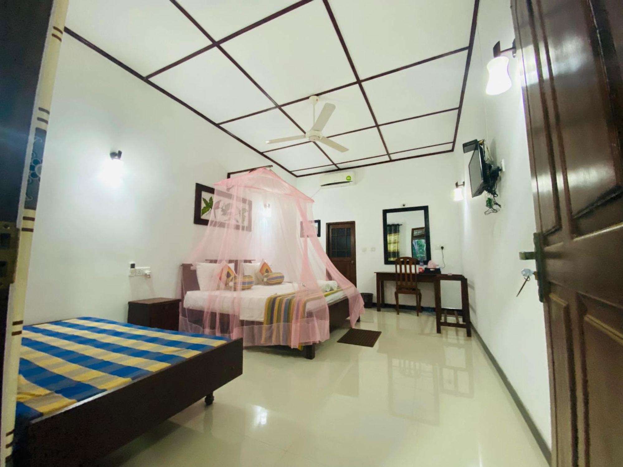 Winmi Resort Habarana Habitación foto